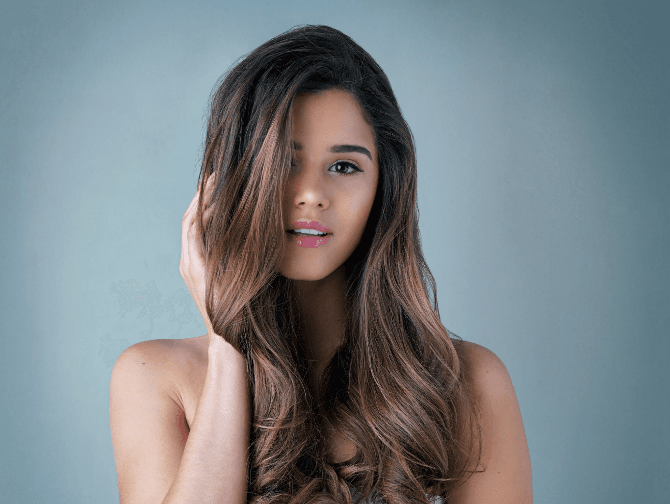 Soft, natural balayage on long brunette hair, showcasing expert colour blending by Honeys Hair & Beauty in Taunton.