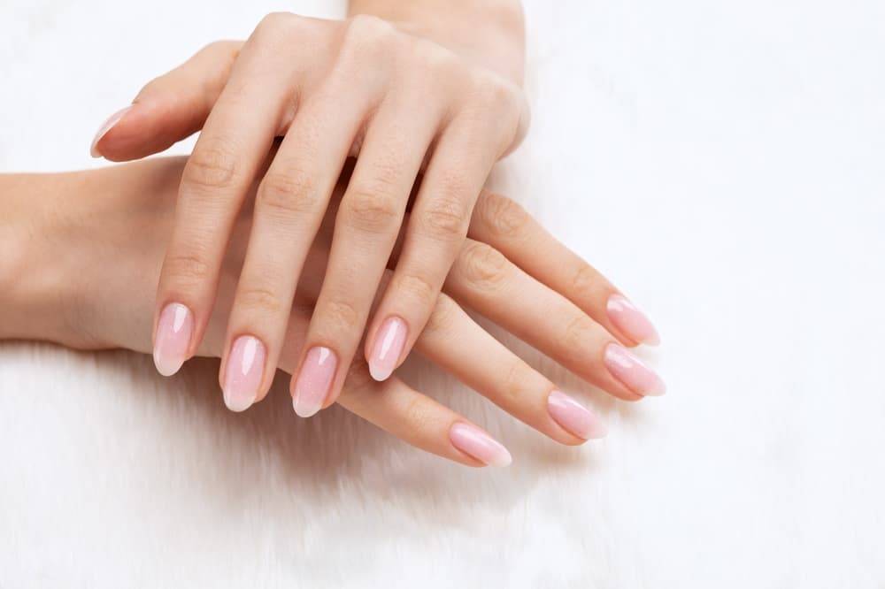 Freshly maintained nail infills with soft pink polish at Honeys Hair & Beauty Taunton
