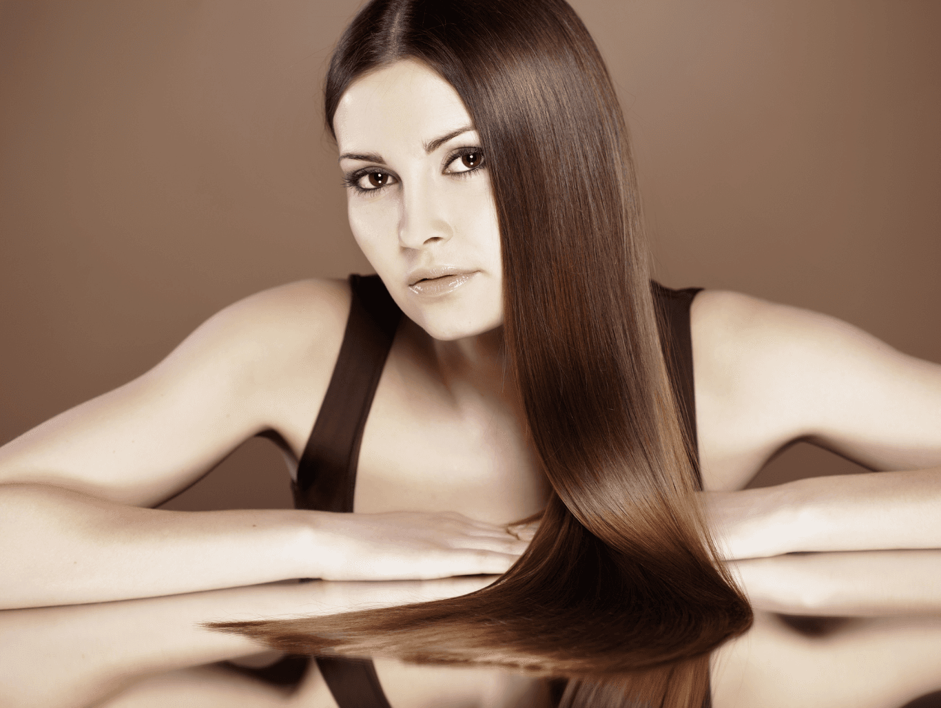 Woman with rich, glossy, natural-looking hair colour after quasi (non-lift) colour treatment at Honeys Hair & Beauty in Taunton.