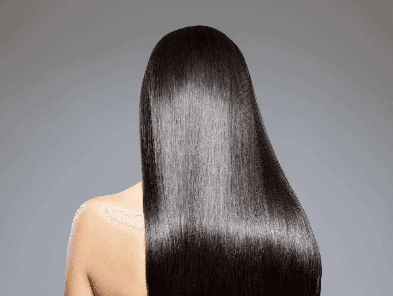 Glossy, rich dark hair after a semi-permanent colour treatment at Honeys Hair & Beauty in Taunton, showcasing vibrant, healthy shine.