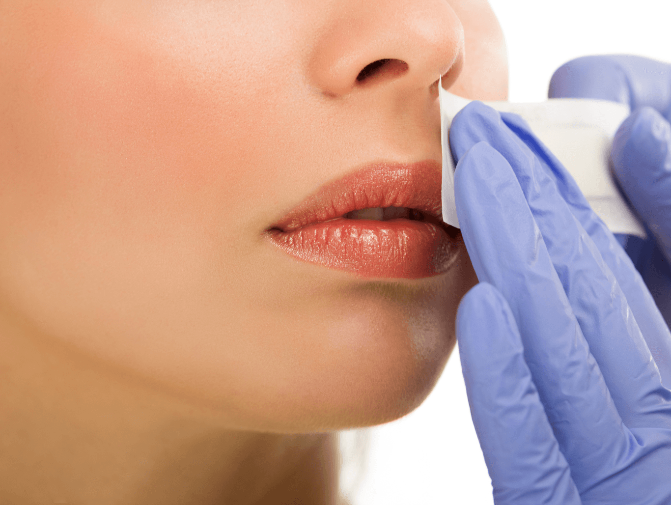 Close-up of a woman receiving an upper lip wax at Honeys Hair & Beauty in Taunton for smooth, hair-free, and polished skin.